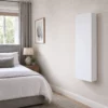 Folding Wall Mounted Ironing Board Cupboard in Bedroom with Closed Door