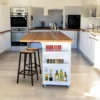 Space-saving kitchen island with cupboard doors and adjustable shelves