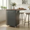 Small Kitchen Island With Fold-Out Table and Drawers as Serving Station