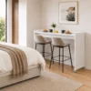 Mobile over-bed desk table with guard rail used as breakfast table