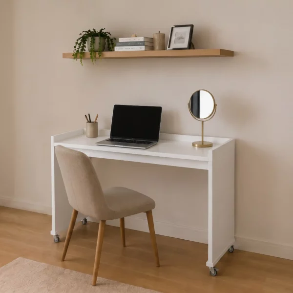 Compact mobile bedroom desk on wheels positioned against wall
