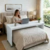 BedBridge mobile over-bed desk on wheels used across bed - White